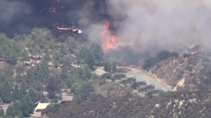 Structures in the Lytle Creek area were threatened by flames on Aug. 17, 2016. (Credit: KTLA)