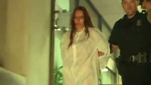 Michelle Martens is seen after she was arrested following her daughter's killing on Aug. 24, 2016. (Credit: KOAT)