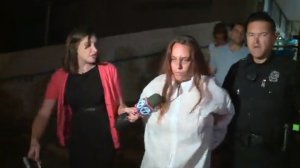 Michelle Martens is seen after she was arrested following her daughter's killing on Aug. 24, 2016. (Credit: KOAT)