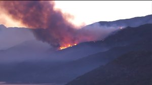 Flames rise from the Pilot Fire on Aug. 8, 2016. (Credit: KTLA)