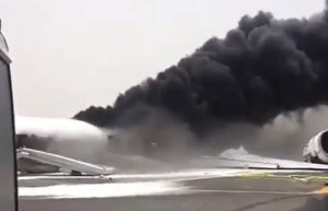 An Emirates flight en route from India appeared to catch fire after it made an emergency landing at Dubai International airport Wednesday, August 3, 2016. (Credit: CNN)