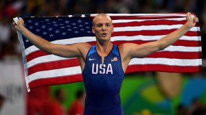 Sam Kendricks of the United States celebrates winning the bronze medal in the Men's Pole Vault Final on Day 10 of the Rio 2016 Olympic Games at the Olympic Stadium in Rio de Janeiro, Brazil. (Credit: Shaun Botterill/Getty Images)