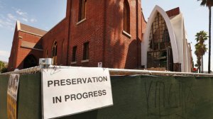 The removal of stained glass from a church being converted to creative offices has angered neighborhood activists in Hollywood. (Credit: Al Seib/Los Angeles Times)