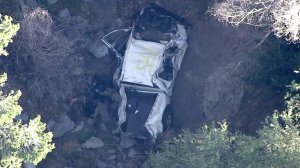 Three bodies were recovered from the wreckage of a truck that plummeted 900 feet off the Angeles Crest Highway on Aug. 2, 2016. (Credit: KTLA)