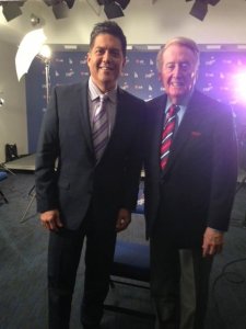 Frank Buckley and Vin Scully pose for a photo in December 2013.