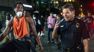 Captain Mike Campagna talks with a demonstrator during protests Sept. 22, 2016 in Charlotte, North Carolina. (Credit: Sean Rayford/Getty Images)