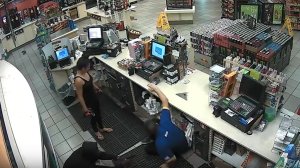 Surveillance video shows two people robbing a cashier at an Arco gas station in Compton on Sept. 22, 2016.
