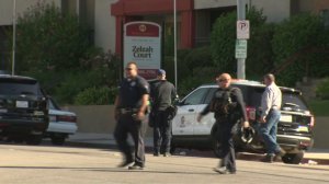 An active police scene at an apartment complex near Cal State Northridge were two people were shot. (Credit: KTLA)