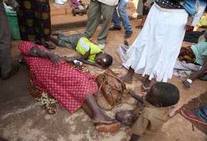 Victims of the earthquake measured 5.7 magnitude which struck the countrys Lake Zone lie on the ground at the Bukoba Referral Hospital for treatment, on September 10, 2016. (Credit: STR/AFP/Getty Images)