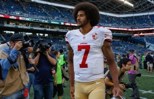 Quarterback Colin Kaepernick of the San Francisco 49ers walks off the field after the game against the Seattle Seahawks at CenturyLink Field on Sept. 25, 2016 in Seattle, Washington. (Credit: Otto Greule Jr/Getty Images)