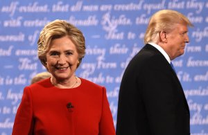 Democratic nominee Hillary Clinton and Republican nominee Donald Trump leave the stage after the first presidential debate at Hofstra University in Hempstead, New York, on Sept. 26, 2016. (Credit: TIMOTHY A. CLARY/AFP/Getty Images)