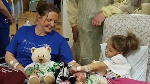 Natasha Fuller with her teacher Jodi Schmidt, left, who donated a kidney to the second grader. (Credit: CNN)