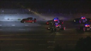 A female driver suspected of DUI led police on a pursuit through South Los Angeles, and gave up about 30 mins later. (Credit: KTLA)