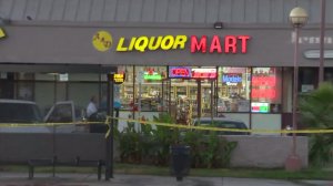A store clerk was killed early Sunday following a shooting inside A & D Liquor Mart in North Hollywood. (Credit: KTLA)