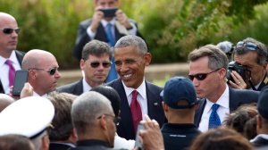 President Barack Obama greets attendees during a ceremony commemorating the September 11, 2001 attacks at the Pentagon in Washington, DC, on September 11, 2016. (Credit: Jose Luis Magana/AFP/Getty Images)