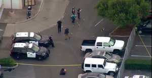 Officials investigate the scene of an officer-involved shooting in El Cajon on Sept. 27, 2016. (Credit: KSWB) 