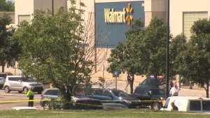 Two good Samaritans risked their lives to save a mom and her baby when they were attacked outside a Wal-Mart in Shawnee, Kansas. (Credit: WDAF)