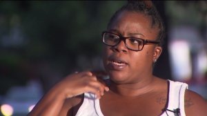 Tanelle Peppers described how an Uber driver became violent after she asked him to stop texting while driving. (Credit: KTLA) 