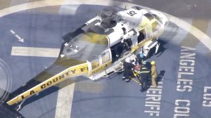 An intruder who was shot outside of a mansion in Malibu by a security guard was airlifted on Oct. 14, 2016. (Credit: KTLA)