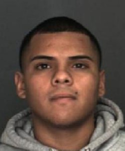 Arturo Perez Medina, 22, was arrested on suspicion of murder in the death of Pfc. Douglas Rivas-Rauda. (Credit: San Bernardino Police Department)