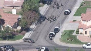 Authorities respond in Lancaster after a sergeant was shot on Oct. 5, 2016. (Credit: KTLA)