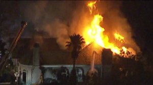 A home in Mount Washington was engulfed in flames on Oct. 20, 2016. (Credit: KTLA)