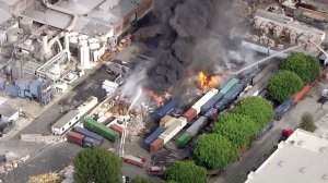 Crews work to put out recycling plant fire in Commerce on Oct. 28, 2016. (Credit: KTLA) 