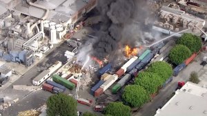 Crews work to put out recycling plant fire in Commerce on Oct. 28, 2016. (Credit: KTLA)