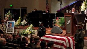 The casket of Lancaster Sgt. Steve Owen is seen during his memorial service on Oct. 13, 2016. (Credit: Pool)