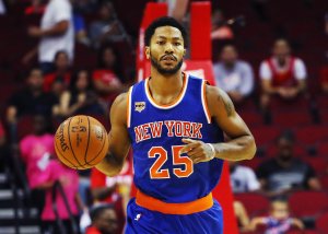 Derrick Rose of the New York Knicks takes the basketball up the court during their game against the Houston Rockets at the Toyota Center on Oct. 4, 2016, in Houston, Texas. (Credit: Scott Halleran/Getty Images)