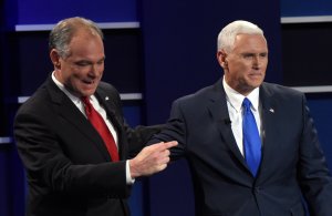 Democratic candidate for Vice President Tim Kaine gestures to Republican candidate for Vice President Mike Pence after the vice presidential debate at Longwood University in Farmville, Virginia on Oct. 4, 2016. (Credit: SAUL LOEB/AFP/Getty Images)