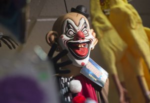 Halloween costumes and props, including a 'scary' clown mask, are seen for sale at Total Party, a party store, in Arlington, Virginia, October 7, 2016. (Getty: SAUL LOEB/AFP/Getty Images)