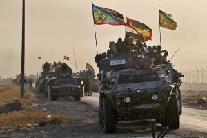 Iraqi forces deploy in the area of al-Shourah, some 45 kms south of Mosul, as they advance towards the city to retake it from the Islamic State (IS) group jihadists, on October 17, 2016. (Credit: AHMAD AL-RUBAYE/AFP/Getty Images)