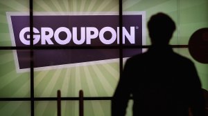 The Groupon logo is displayed in the lobby of the company's international headquarters on June 10, 2011 in Chicago, Illinois. (Credit: Scott Olson/Getty Images)