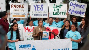 Maria Silva, a parent of a charter school graduate, speaks to parents and charter school supporters during a rally in front of Huntington Park City Hall to protest a moratorium on new charter schools. (Credit: Allen J. Schaben / Los Angeles Times)