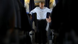 John Podesta, campaign chairman for Hillary Clinton, aboard the the Clinton campaign plane while traveling to Raleigh Durham International Airport on September 27, 2016. (Credit: Justin Sullivan/Getty Images)