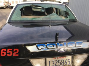 The back window of a patrol cruiser was shattered by a barrage of gunfire on Oct. 23, 2016 in Madera. (Credit: Madera Police Department)