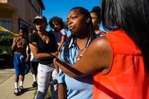 Monique Morgan, mother of Carnell Snell Jr., pleads with Los Angeles police to let her see her son after he was fatally shot on Oct. 1, 2016. (Credit: Barbara Davidson / Los Angeles Times)