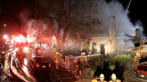 Crews battle a residential fire in Mount Washington on Oct. 20, 2016. (Credit: LAFD / Harry Garvin)