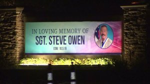 A sign honoring slain Sgt. Steve Owen is seen outside a church in Lancaster on Oct. 13, 2016. (Credit: KTLA)