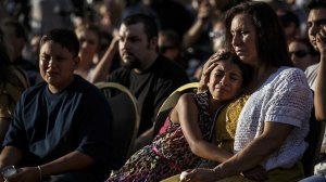 The Palm Springs community mourns along with the family of slain Officer Jose “Gil” Vega during the memorial. (Credit: Marcus Yam/Los Angeles Times)