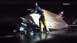 A family was sent into the water after their boat capsized off the Ventura coast on Oct. 26, 2016. (Credit: OnScene.TV)