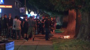 A crowd gathers at the scene of a fatal crash in Upland on Oct. 27, 2016. (Credit: KTLA)