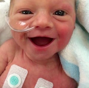 Baby Freya was all smiles when she was just 5 days old. (Credit: Lauren Vinje)  