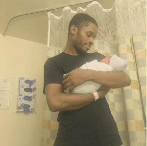 Amaan Lowman is shown in a family photo holding his newborn baby daughter on Oct. 25, 2016. 