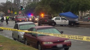 Police investigate a fatal crash in South Los Angeles on Oct. 17, 2016. (Credit: KTLA)