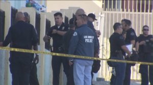 Los Angeles police are shown at the scene of an officer-involved shooting in South Los Angeles on Oct. 1, 2016. (Credit: KTLA)