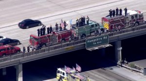 Firefighters paid tribute to fallen fire engineer Ryan Osler on Oct. 3, 2016. (Credit: KTLA) 