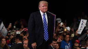 Republican presidential nominee Donald Trump greets supporters during a campaign rally in Novi, Michigan, on Sept. 30, 2016. (Credit: Jewel Samad/AFP/Getty Images)