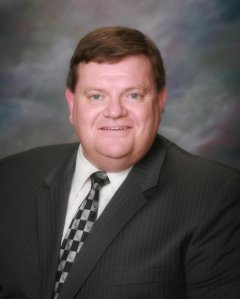 Michael Spence is shown in an undated and now deleted photo on the City of West Covina's website.